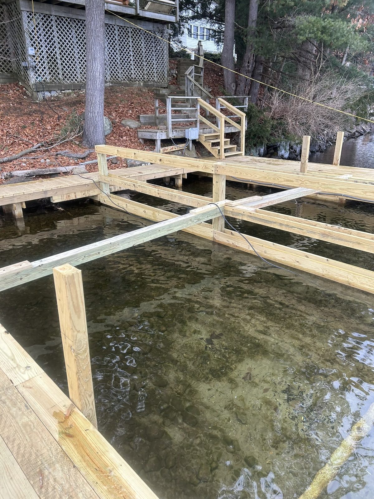 Crib and pier framing under construction near the shoreline