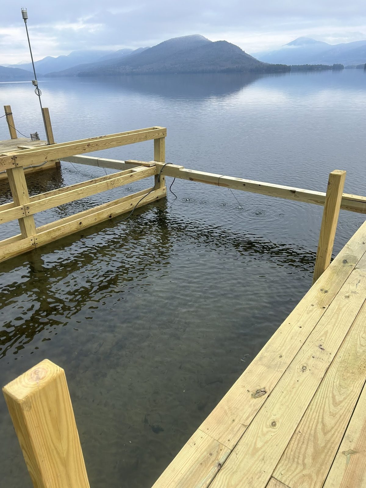 New crib framing standing in shallow Lake George water