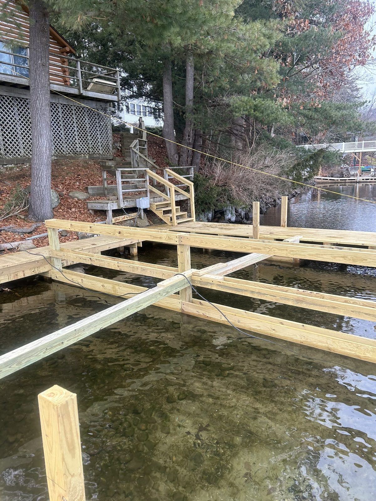 Pier and crib framing laid out over the water