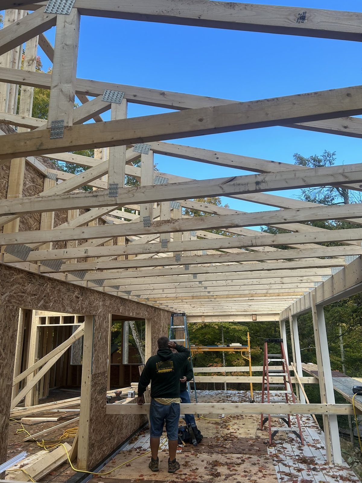 Deck and porch structure rebuilt down to the framing