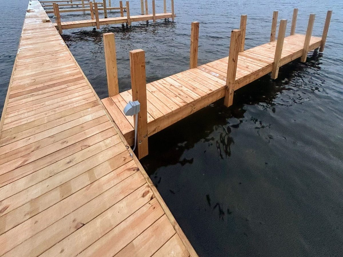 New cedar dock with pressure-treated pilings on Lake George