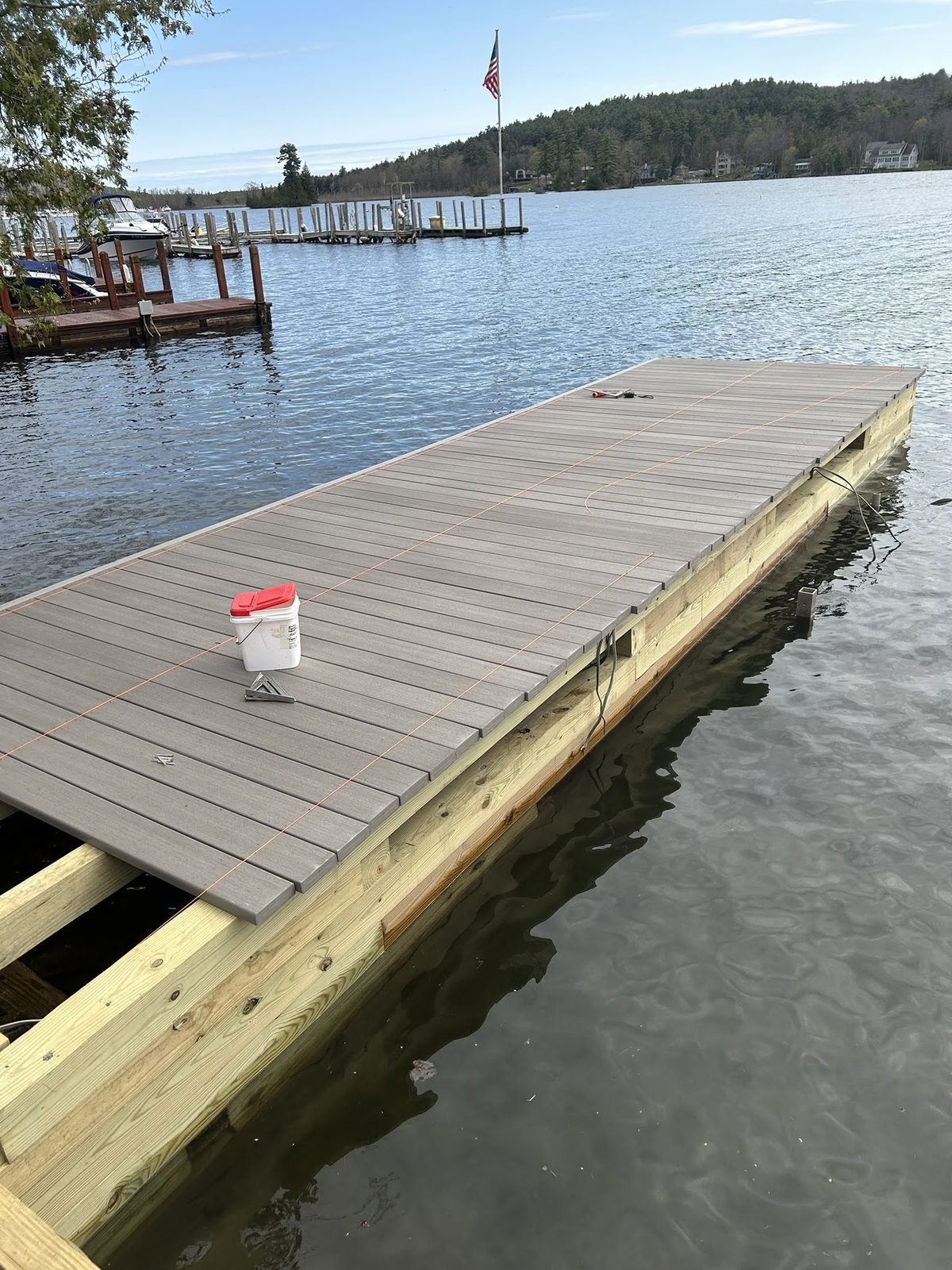 Composite-decked dock with gray boards and clean edge detail