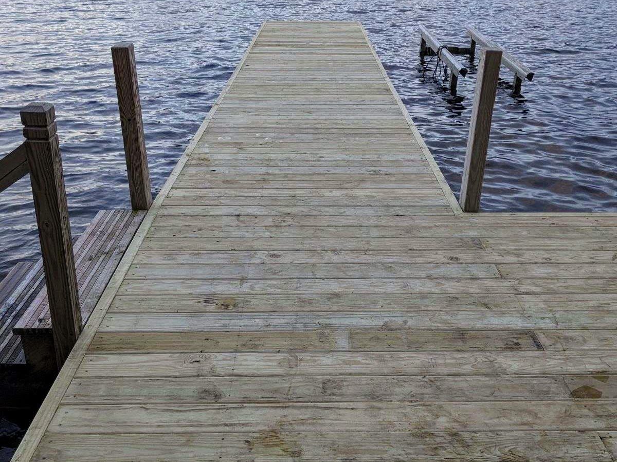 Finished T-shaped dock with wide decking on Lake George