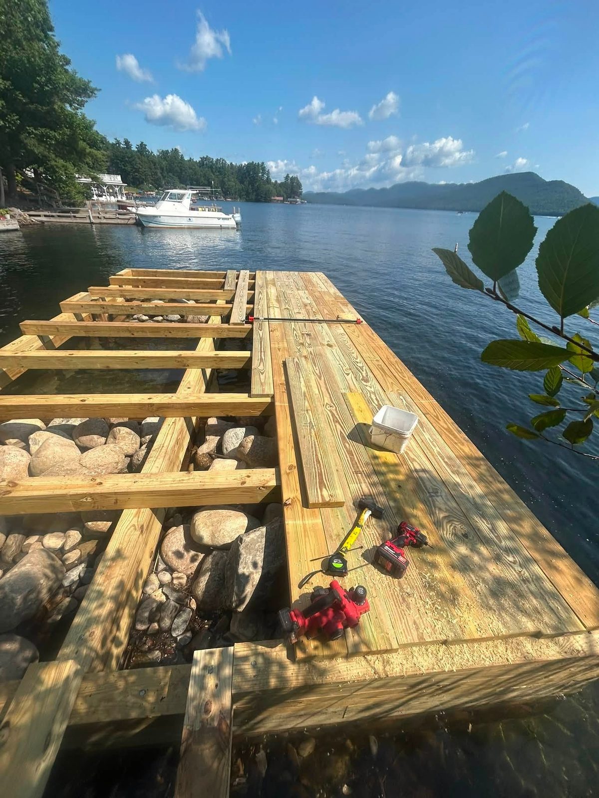 New dock framing set over a stone-filled timber crib at the Fresh Water Institute on Lake George