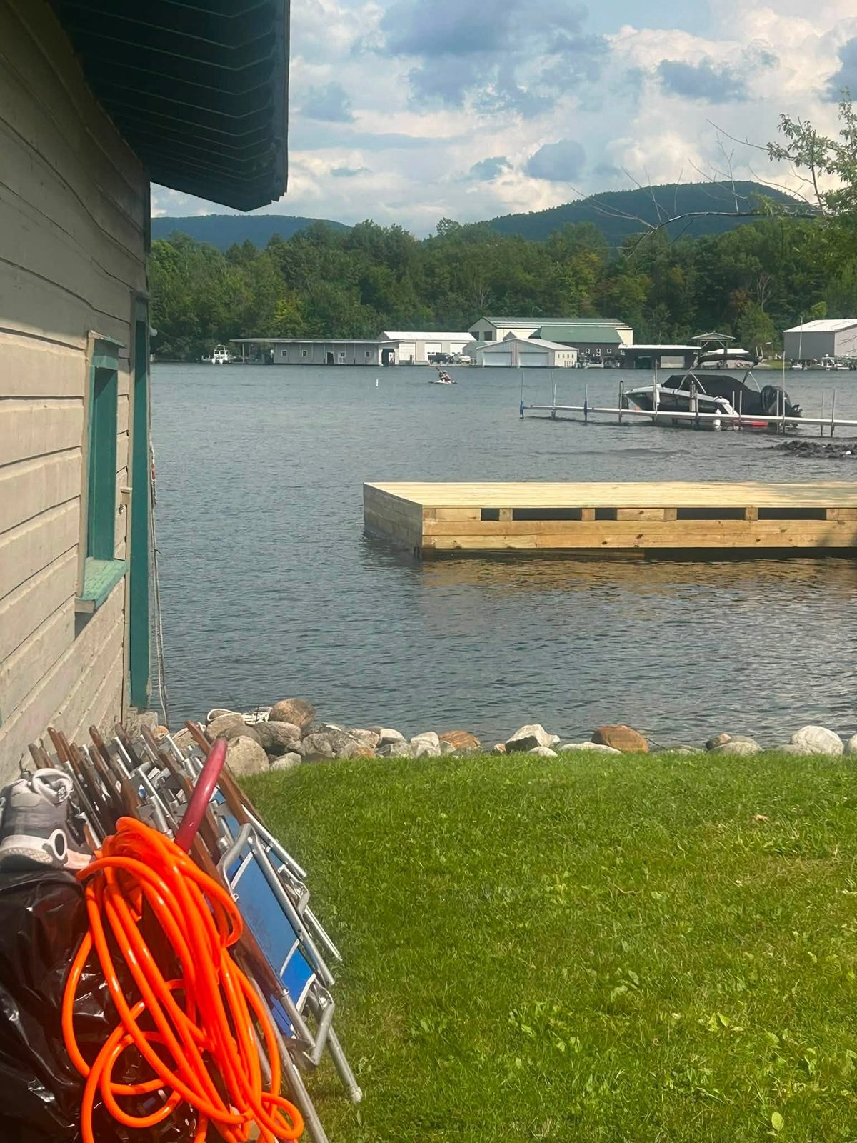 New Fresh Water Institute dock beyond the rebuilt rock shoreline and boathouse