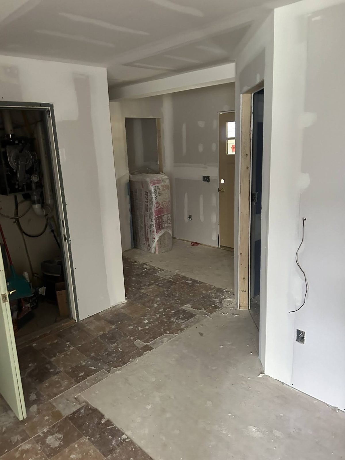 Interior entry and hallway during a full home remodel