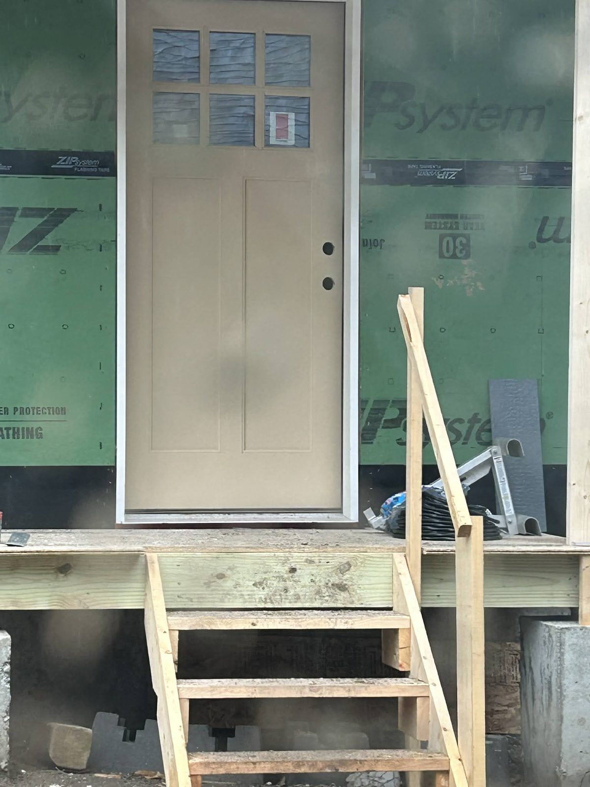 New exterior door installed during a home envelope upgrade
