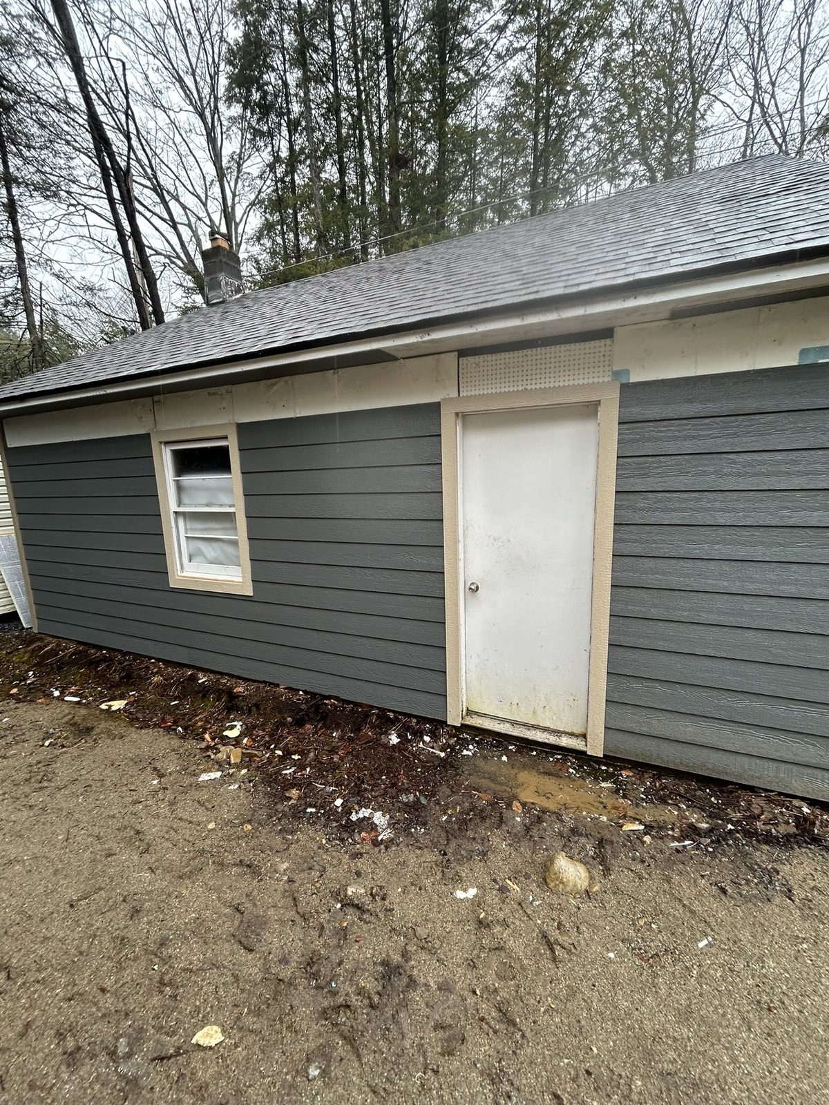 Detached garage prepared for exterior renovation