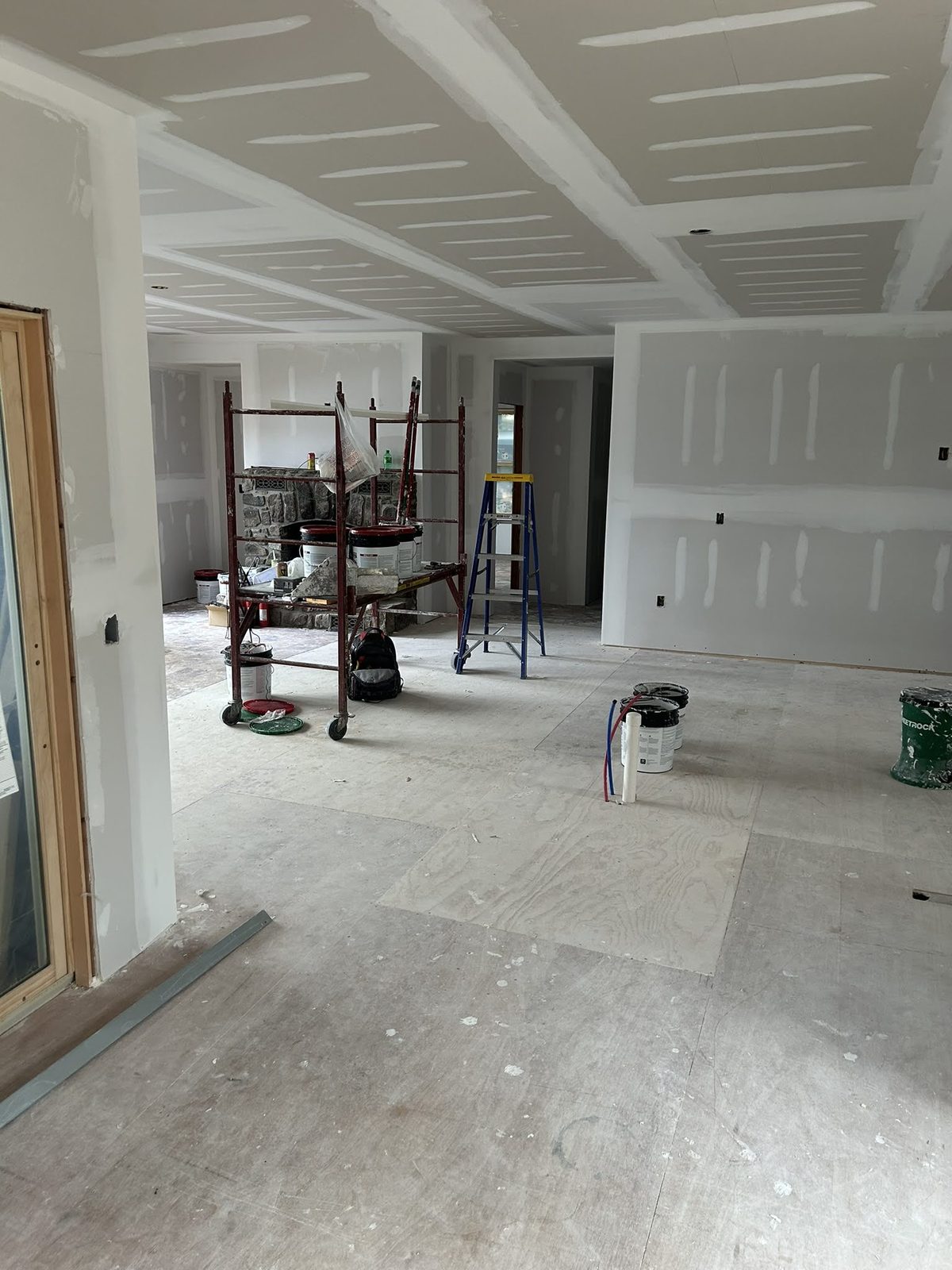 Interior renovation with spiral stair and lake-facing glass