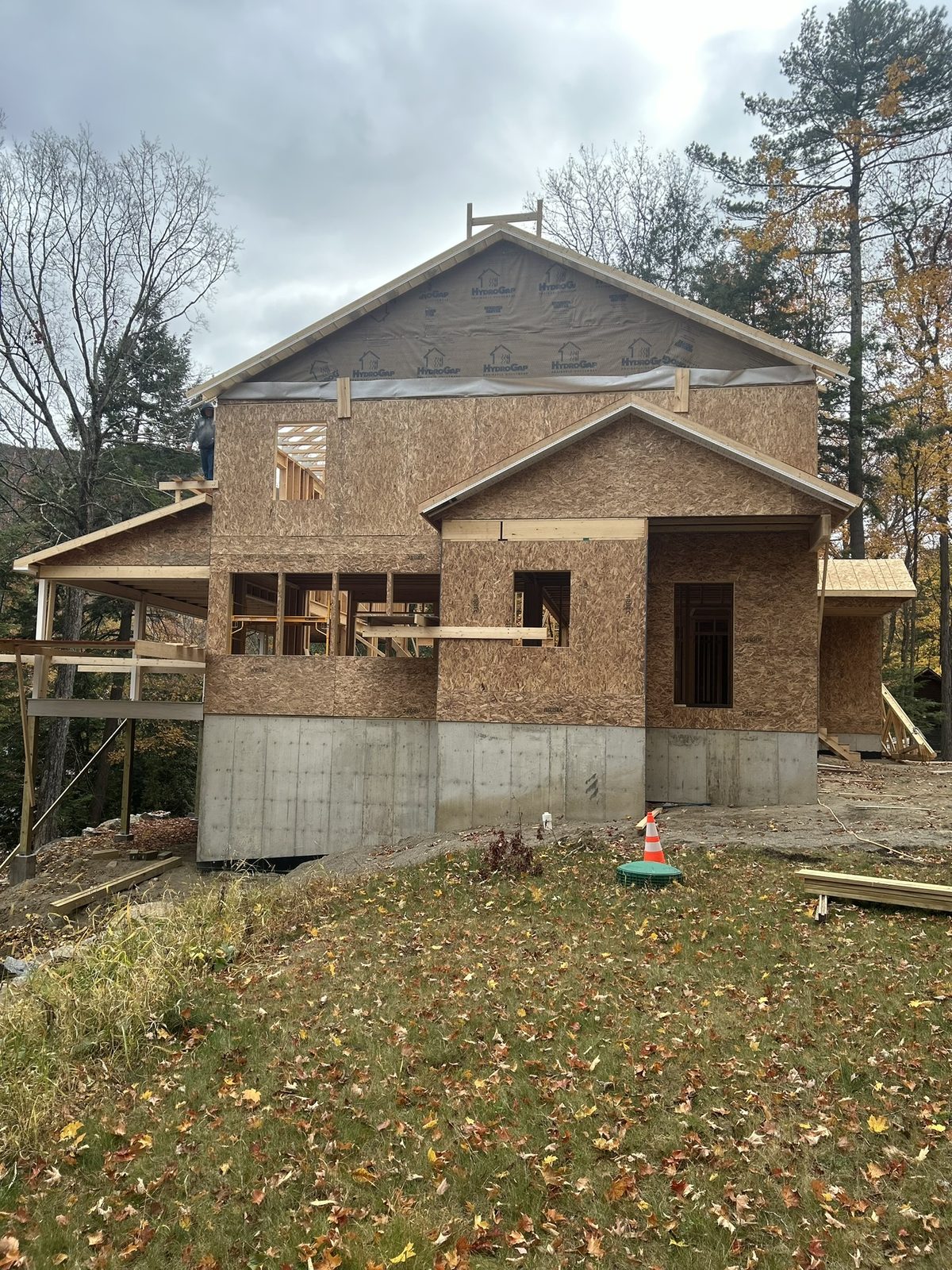 New home under construction with sheathing complete