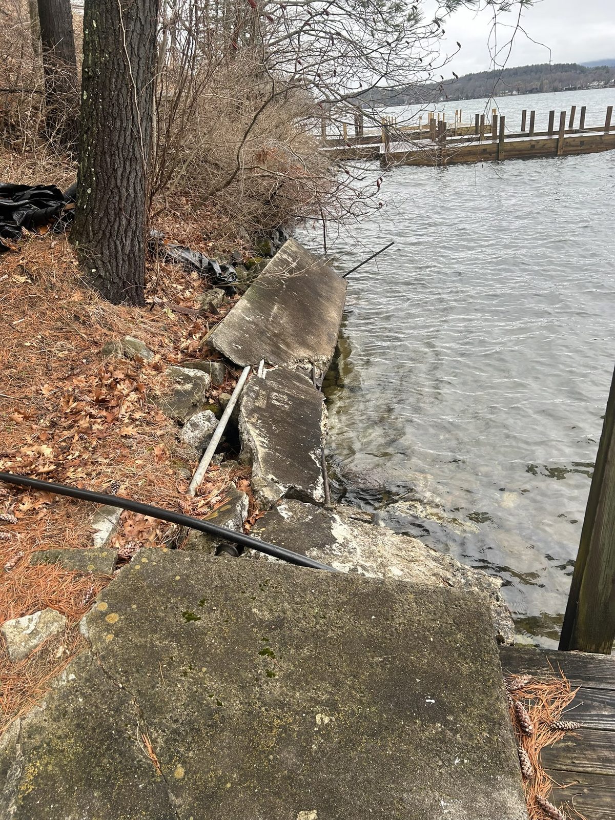 Storm-damaged shoreline structure awaiting repair